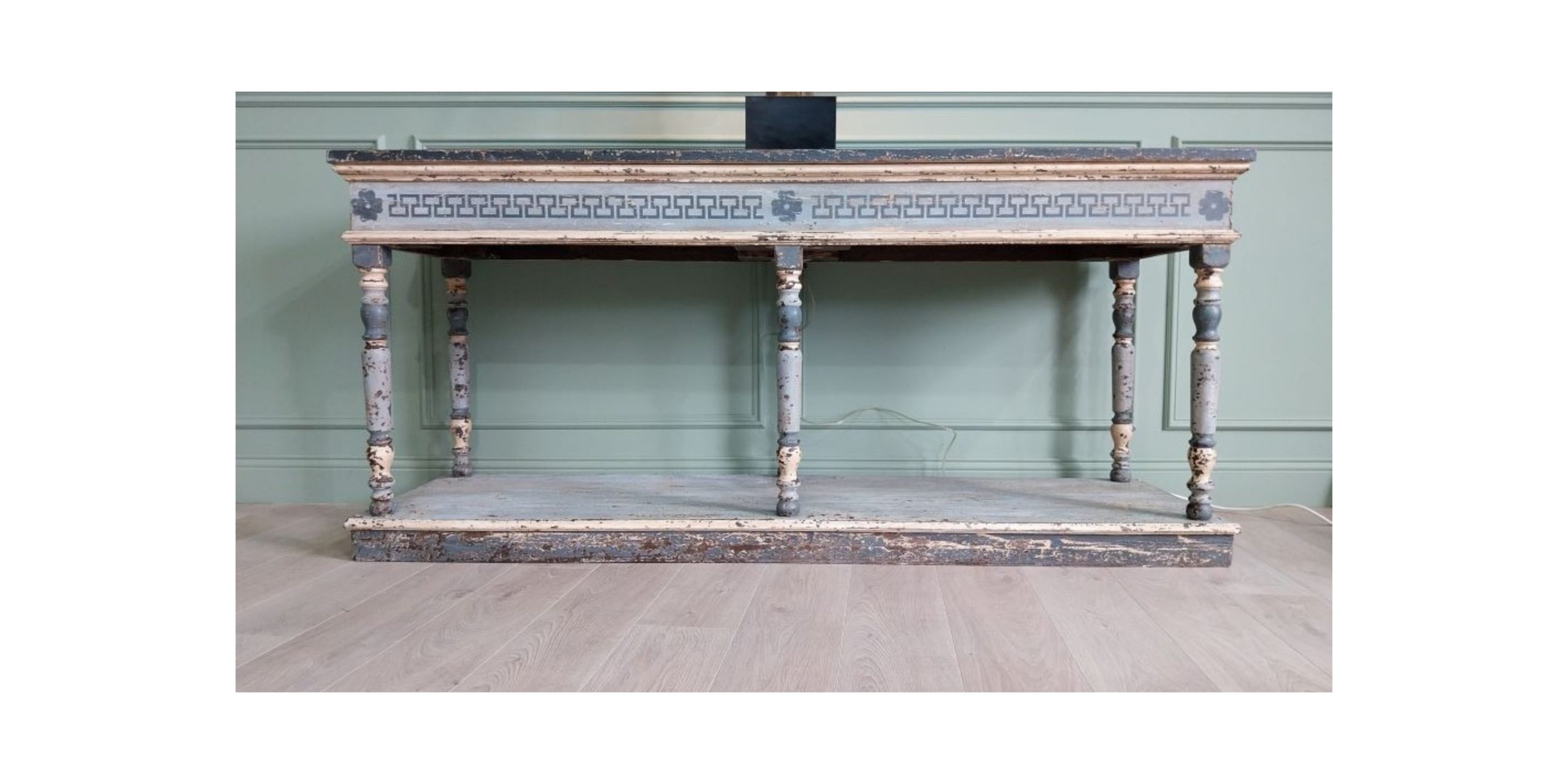 Italian carved and patinated wood console table in the Neoclassical style